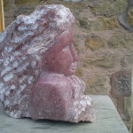 red head sculpture carved in indian soapstone